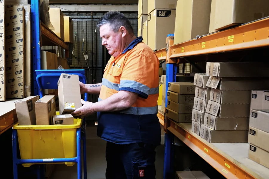 Employee in the WesTrac Cobar parts warehouse