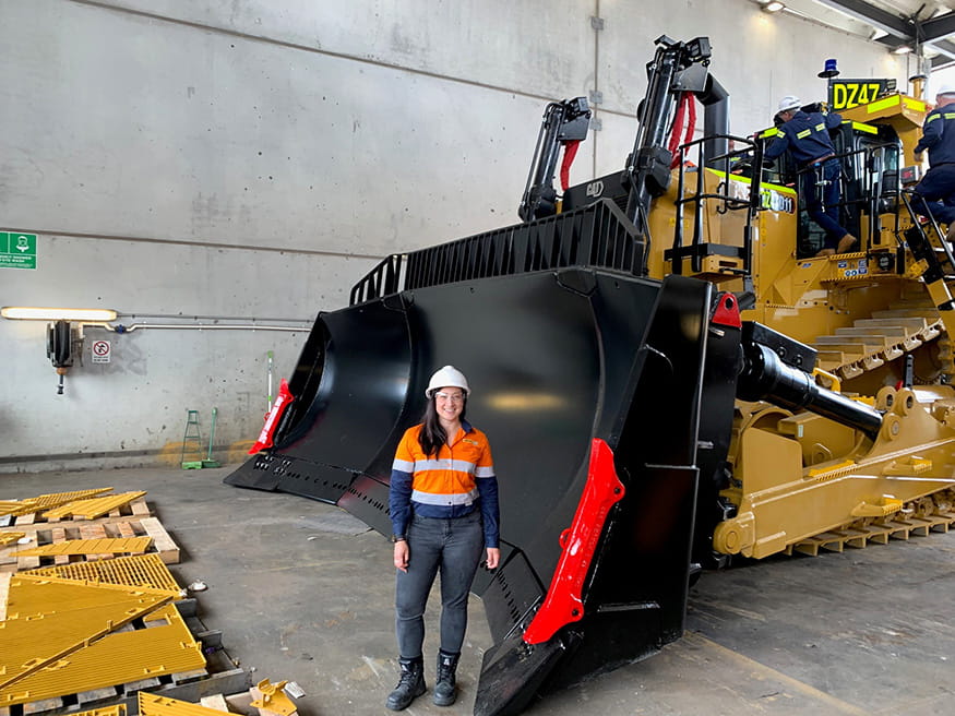 Joanne Henry in front of Cat Dozer