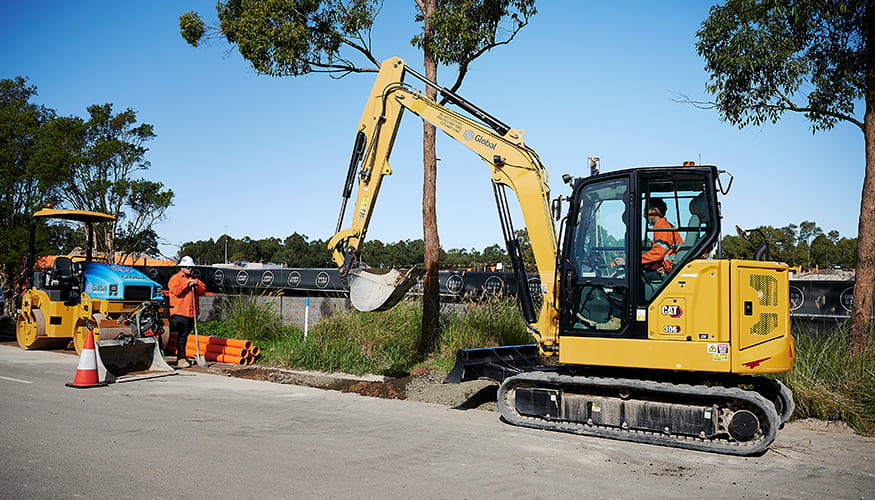 Cat Mini Excavator in action