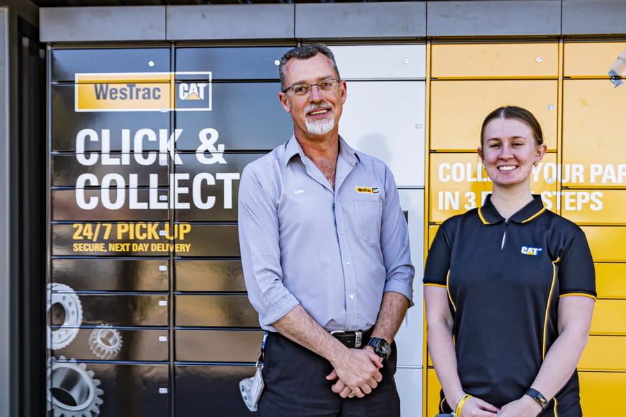 2 Employees in front of the WesTrac Customer Service Centre Click & Collect Locker