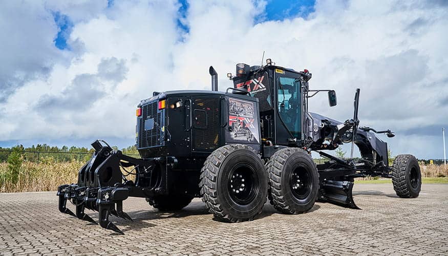 Behind the black Cat Grader