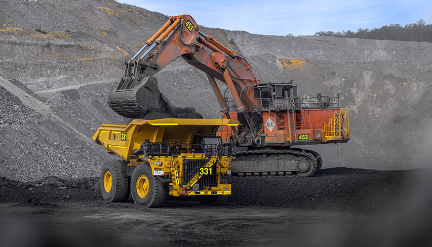 Cat Off Highway Truck being loaded