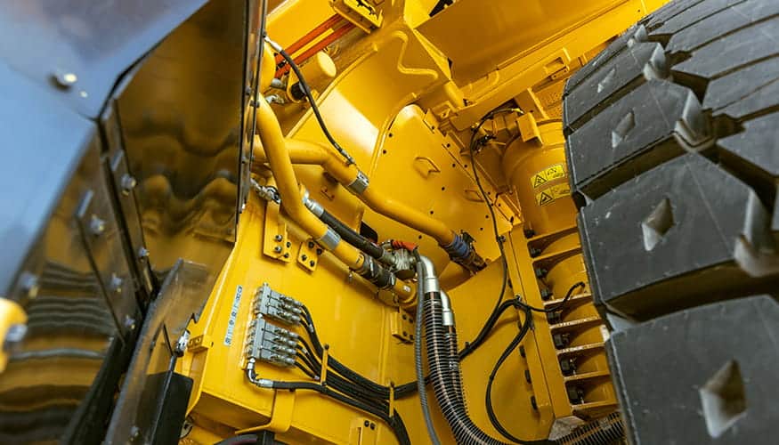 Under a sound suppressed Cat mining truck