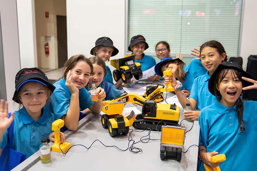 Class of kids in the booth