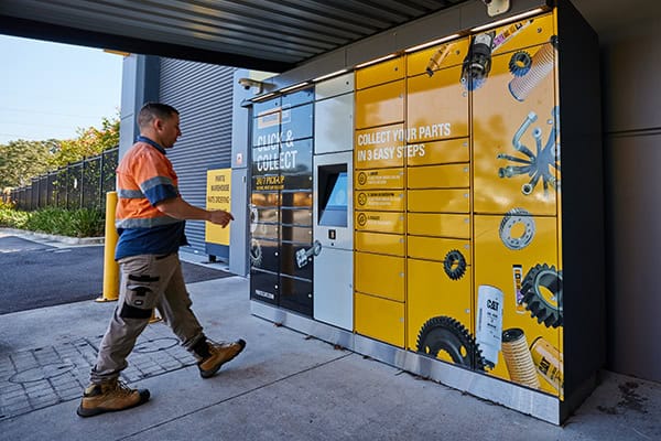 Customer walking to Click and Collect locker