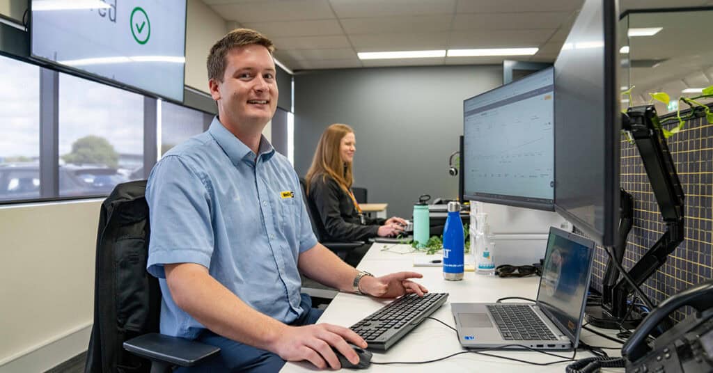 Male WesTrac engineer working on a design