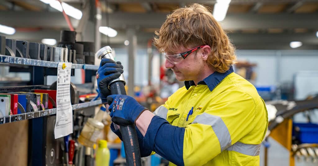 WesTrac team member at WesTrac Perth Customer Service Centre in the hose shop