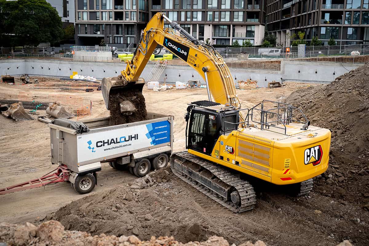 Chalouhi Cat® 340 Excavator and trailer